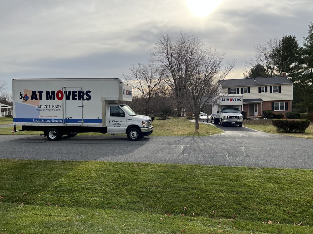 AT Movers team member preparing packing materials