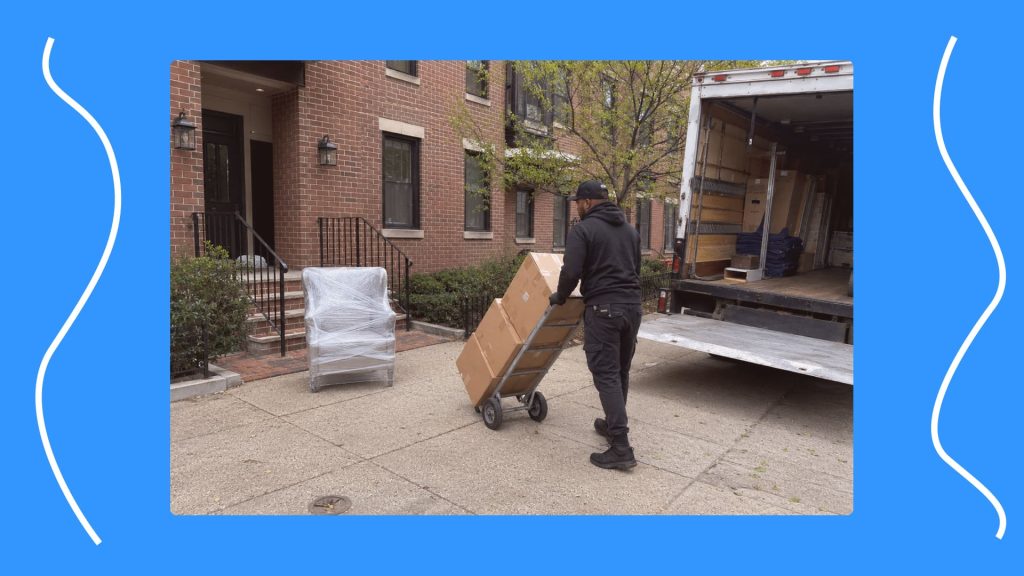 Moving truck parked near a DC apartment building during a small move